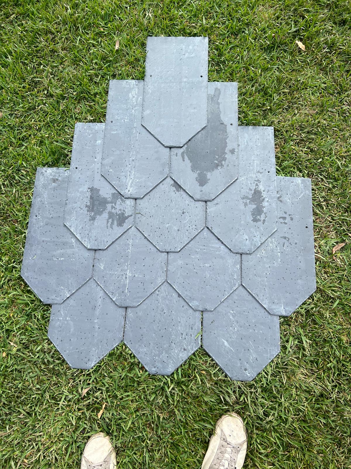 Elegant fish scale slate tiles on a roof